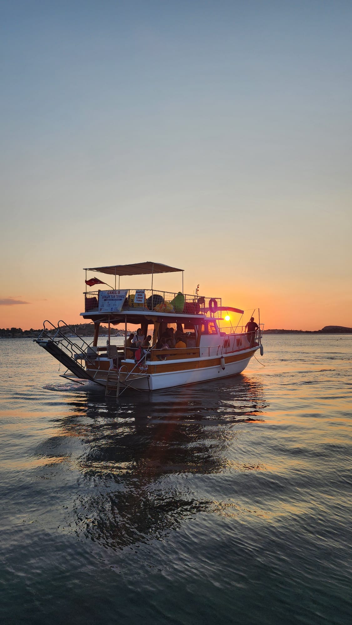 Cakil boat in Eski Foca at sunset